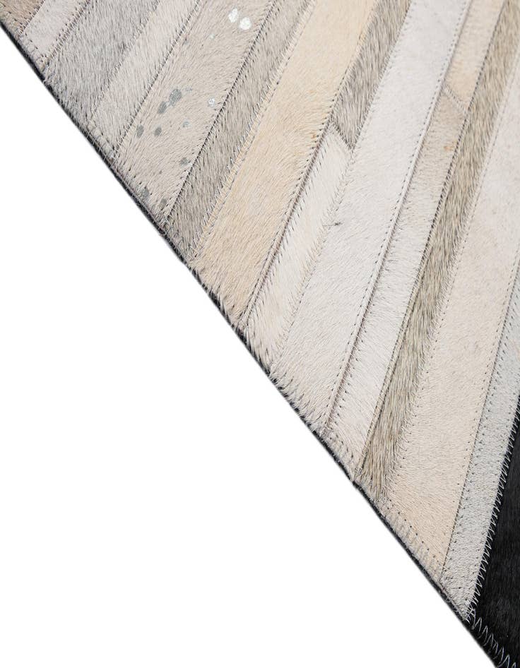 Detail image of  5' 2 x 8' 1 Cowhide - Patchwork Rug