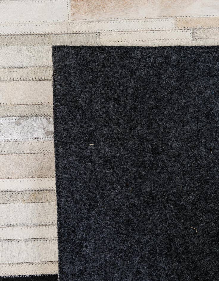 Detail image of  5' 2 x 8' 1 Cowhide - Patchwork Rug