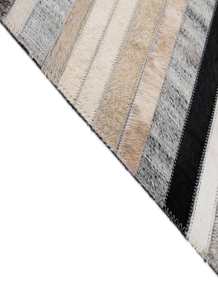Detail image of  5' 1 x 8' 1 Cowhide - Patchwork Rug