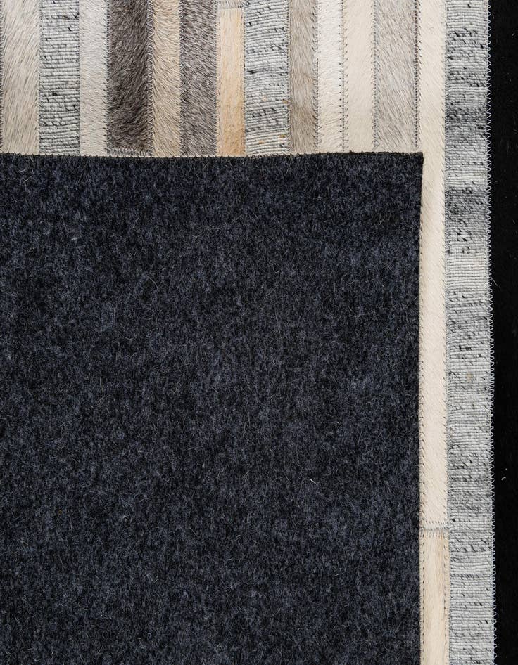 Detail image of  5' 1 x 8' 1 Cowhide - Patchwork Rug