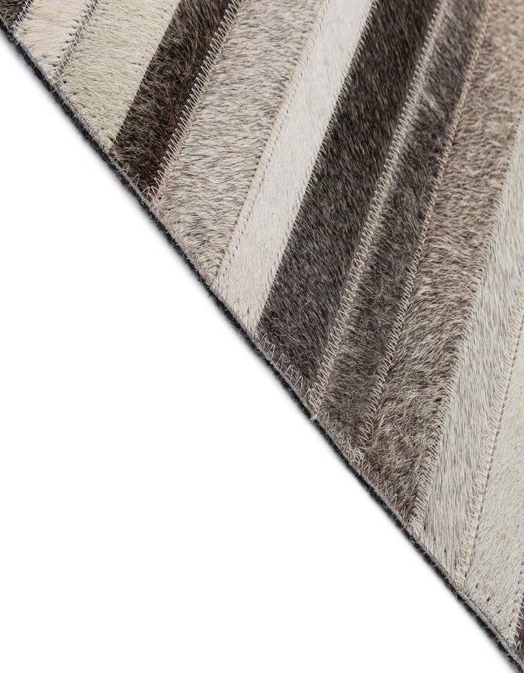 Detail image of  5' 2 x 8' Cowhide - Patchwork Rug