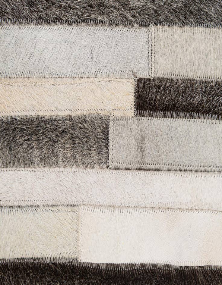 Detail image of  5' 2 x 8' Cowhide - Patchwork Rug