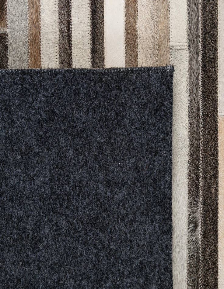 Detail image of  5' 2 x 8' Cowhide - Patchwork Rug