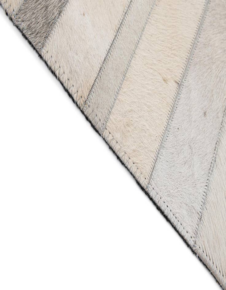 Detail image of  4' 11 x 7' 8 Cowhide - Patchwork Rug