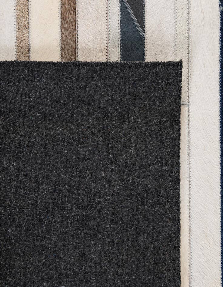 Detail image of  4' 11 x 7' 8 Cowhide - Patchwork Rug