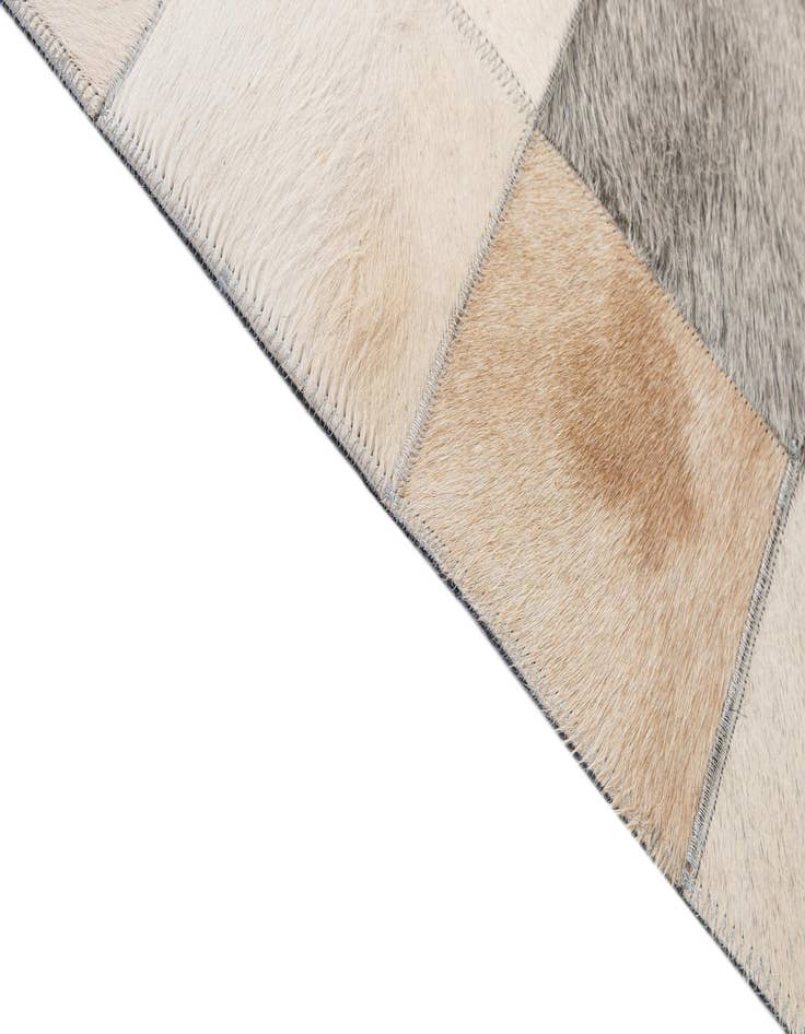 Detail image of  5' 1 x 7' 10 Cowhide - Patchwork Rug