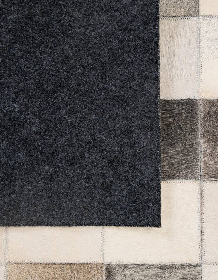 Detail image of  5' 1 x 7' 10 Cowhide - Patchwork Rug