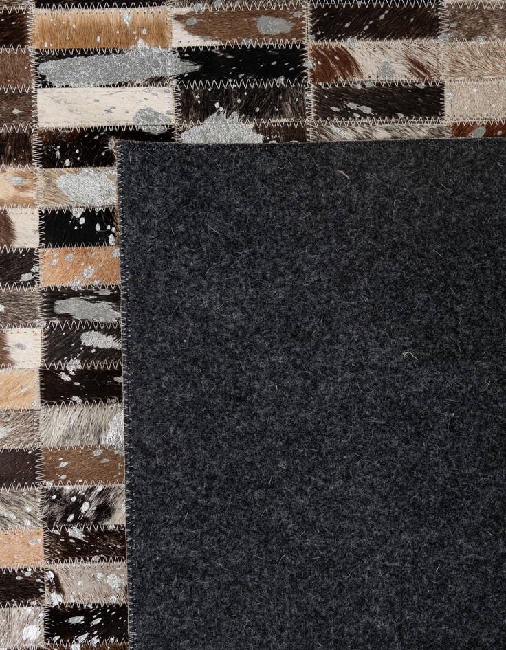 Detail image of  5' 1 x 8' Cowhide - Patchwork Rug