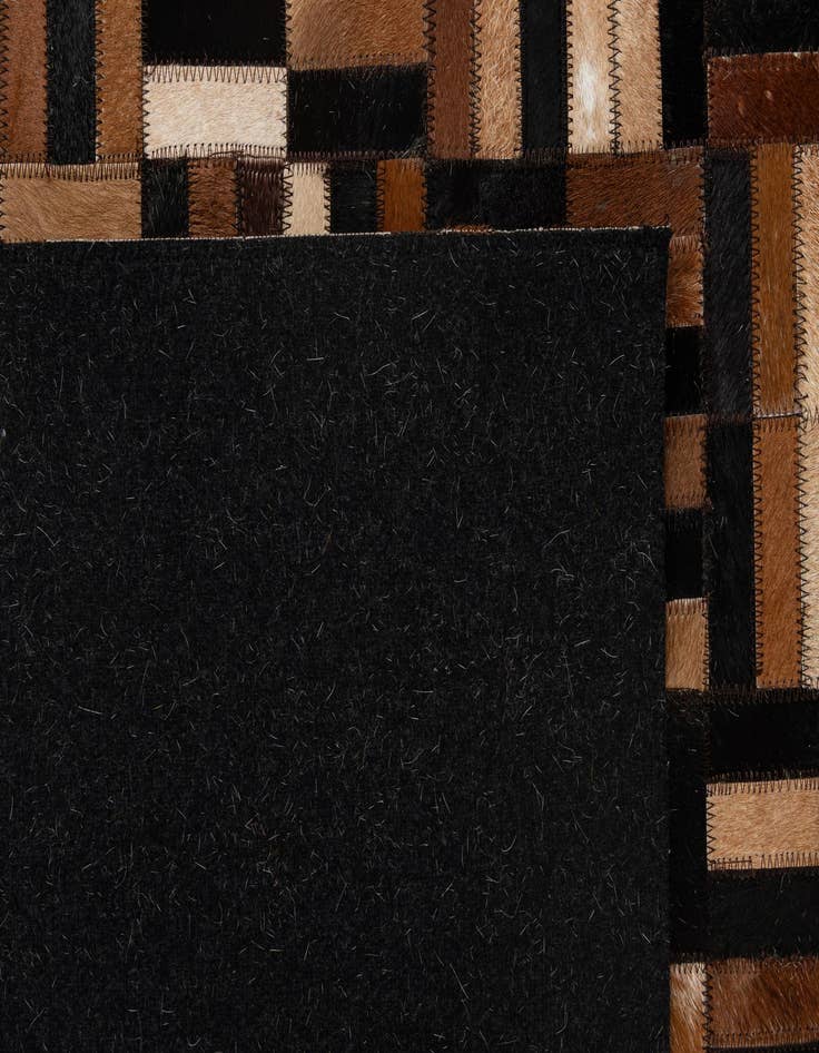 Detail image of  4' 11 x 7' 11 Cowhide - Patchwork Rug