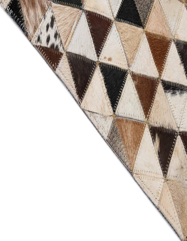 Detail image of  5' 1 x 7' 11 Cowhide - Patchwork Rug