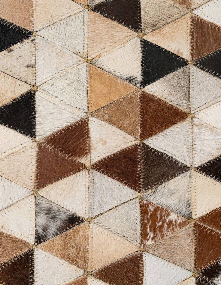 Detail image of  5' 1 x 7' 11 Cowhide - Patchwork Rug