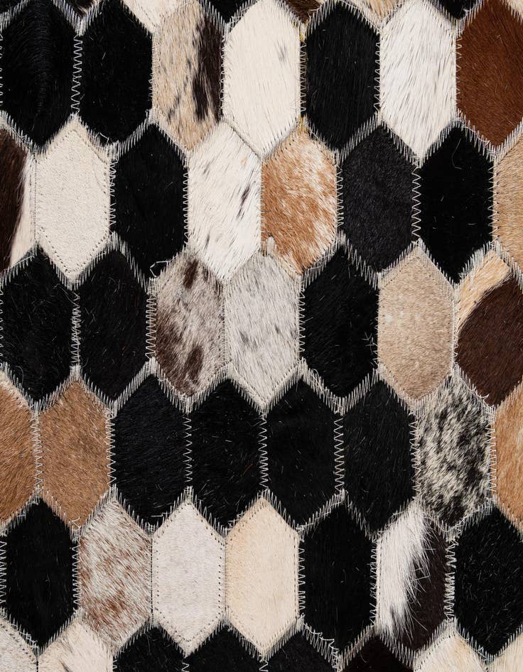 Detail image of  5' 1 x 8' 1 Cowhide - Patchwork Rug