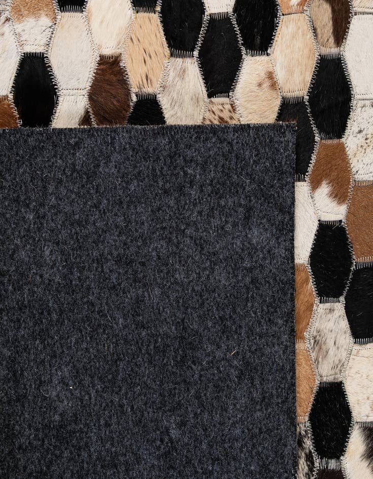 Detail image of  5' 1 x 8' 1 Cowhide - Patchwork Rug