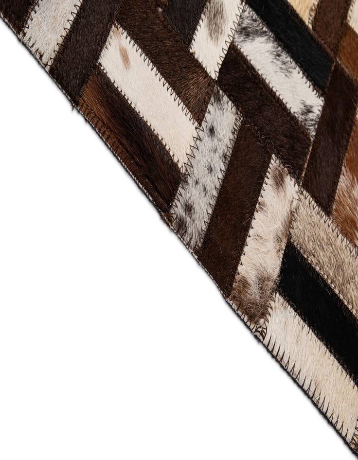 Detail image of  4' 11 x 7' 11 Cowhide - Patchwork Rug