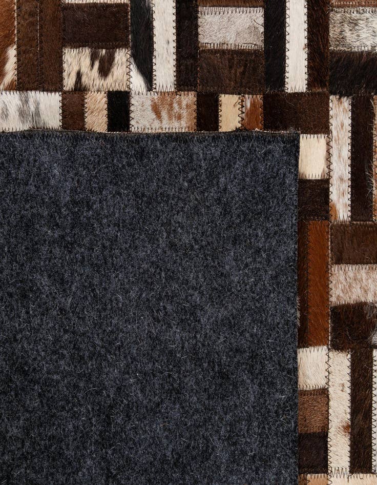 Detail image of  4' 11 x 7' 11 Cowhide - Patchwork Rug