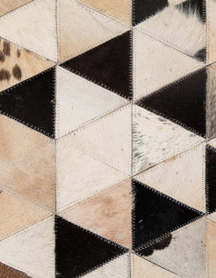 Detail image of  5' 2 x 8' Cowhide - Patchwork Rug