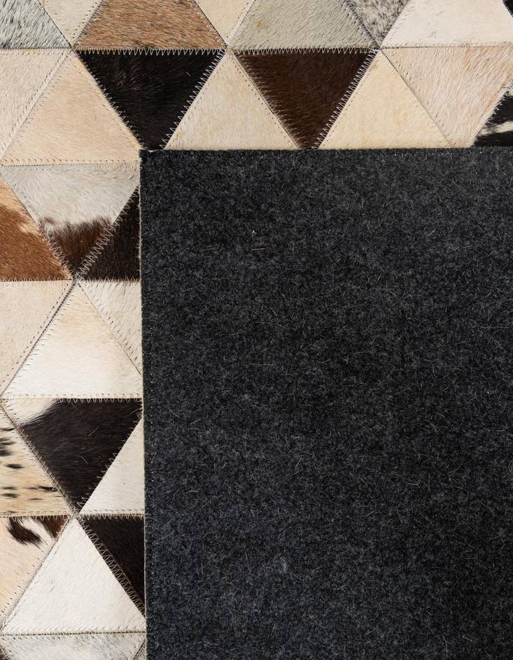 Detail image of  5' 2 x 8' Cowhide - Patchwork Rug