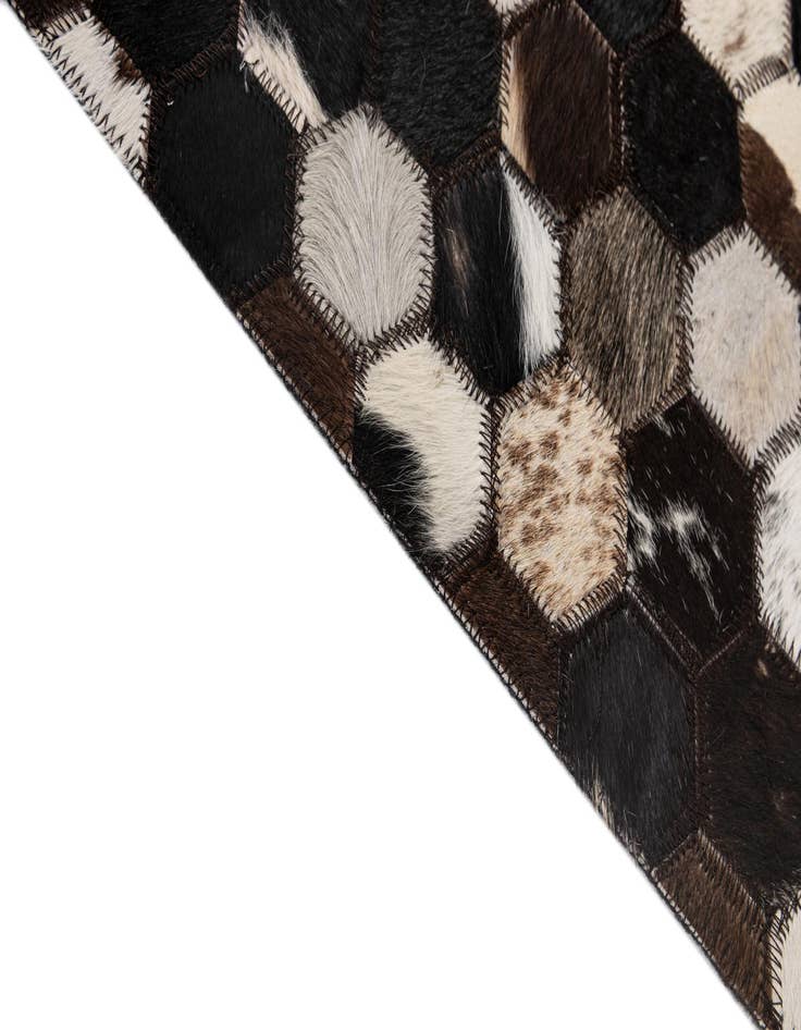 Detail image of  5' 1 x 8' 1 Cowhide - Patchwork Rug