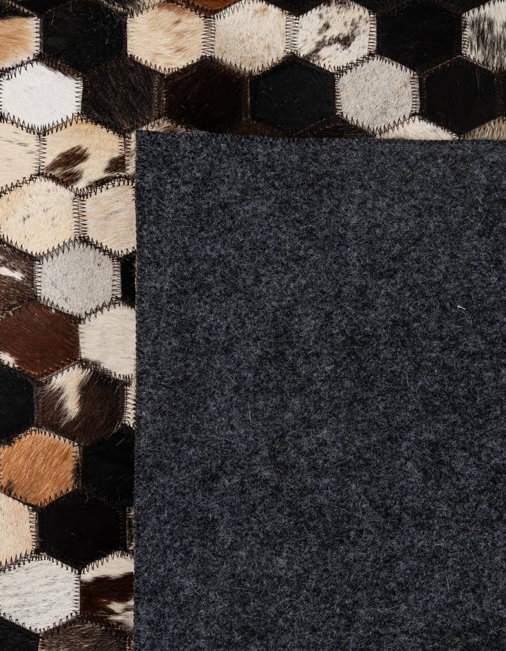 Detail image of  5' 1 x 8' 1 Cowhide - Patchwork Rug