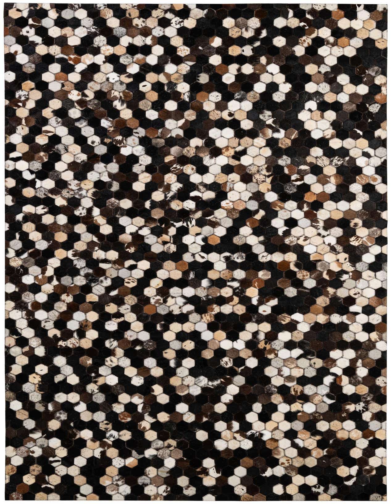 A 5x8 rectangular Cowhide & Leather rug with a modern patchwork pattern of multi-colored hexagonal cowhide pieces.