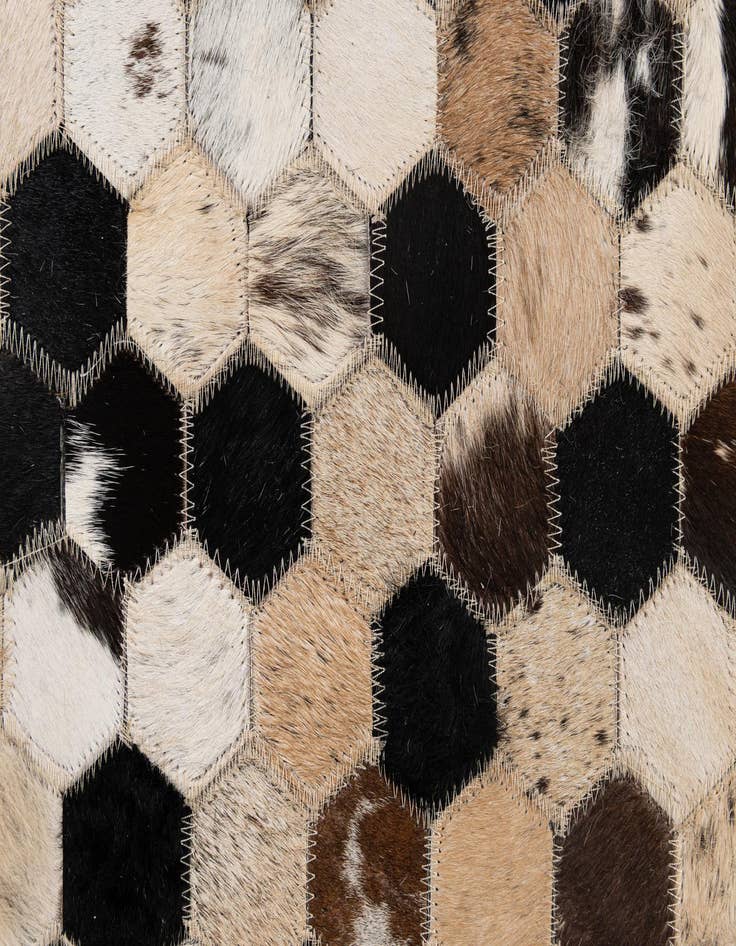 Detail image of  5' 1 x 7' 11 Cowhide - Patchwork Rug