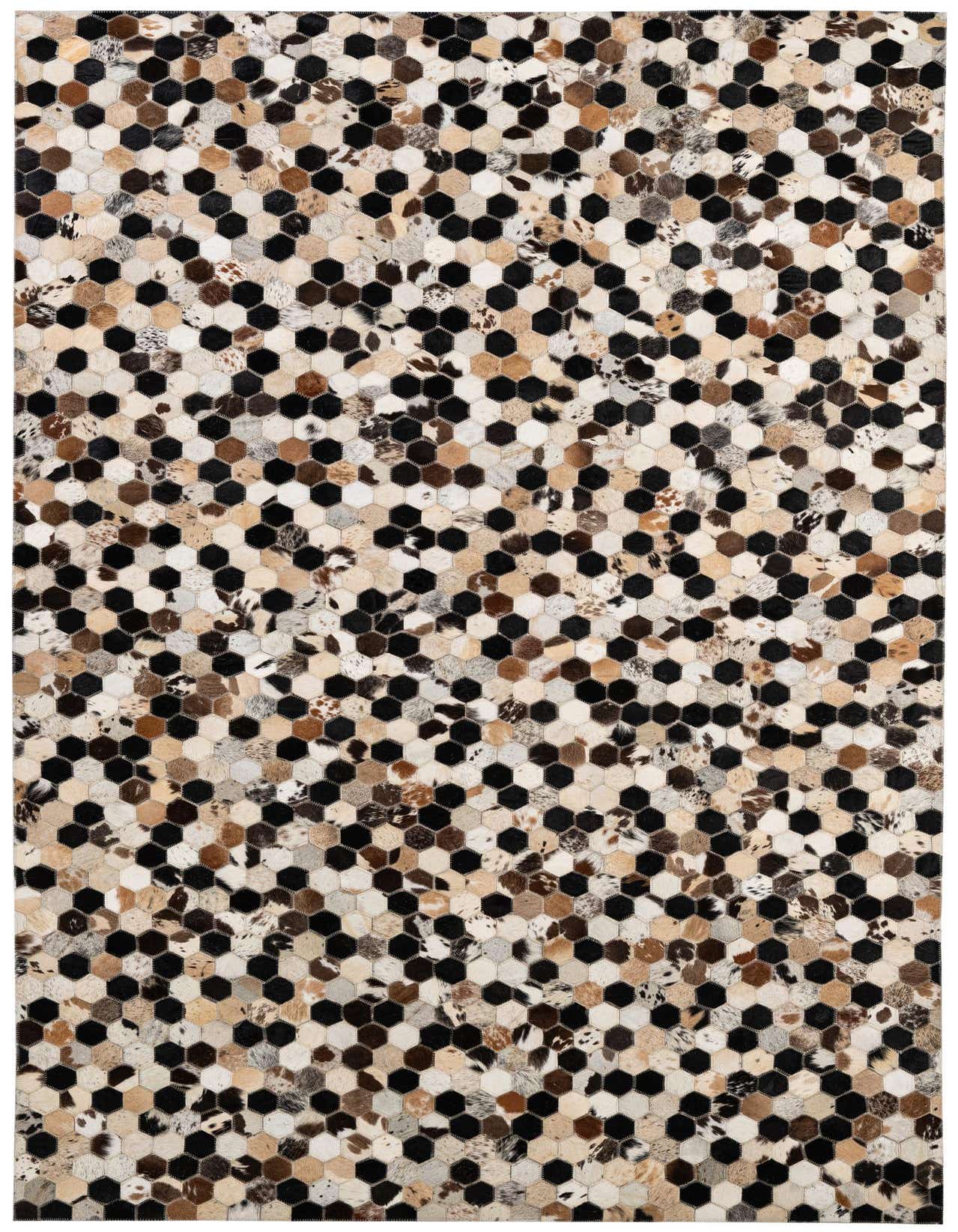 A 5x8 rectangular Cowhide Patchwork rug featuring a modern hexagonal pattern in multi-colored natural cowhide and black leather.