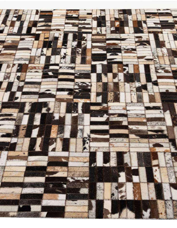 Detail image of  4' 11 x 7' 10 Cowhide - Patchwork Rug