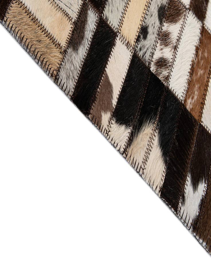 Detail image of  4' 11 x 7' 10 Cowhide - Patchwork Rug