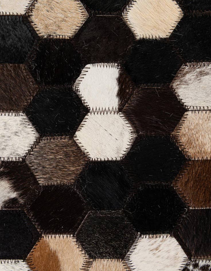 Detail image of  5' 2 x 7' 11 Cowhide - Patchwork Rug