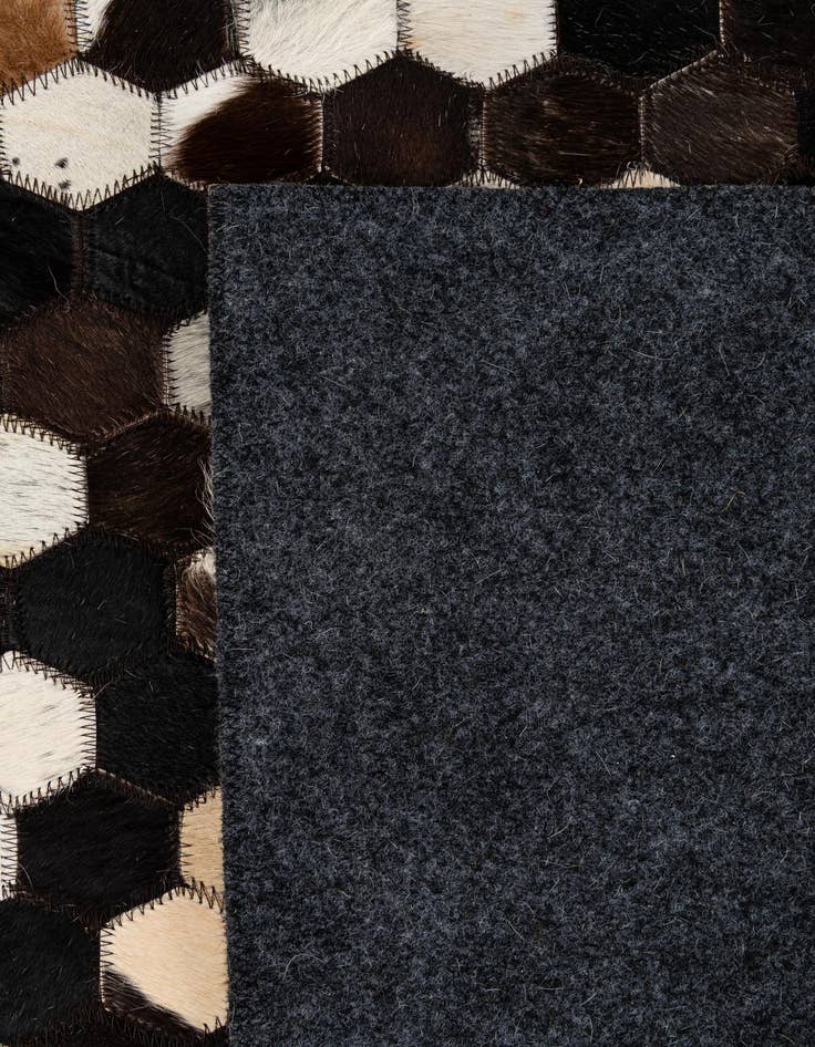 Detail image of  5' 2 x 7' 11 Cowhide - Patchwork Rug