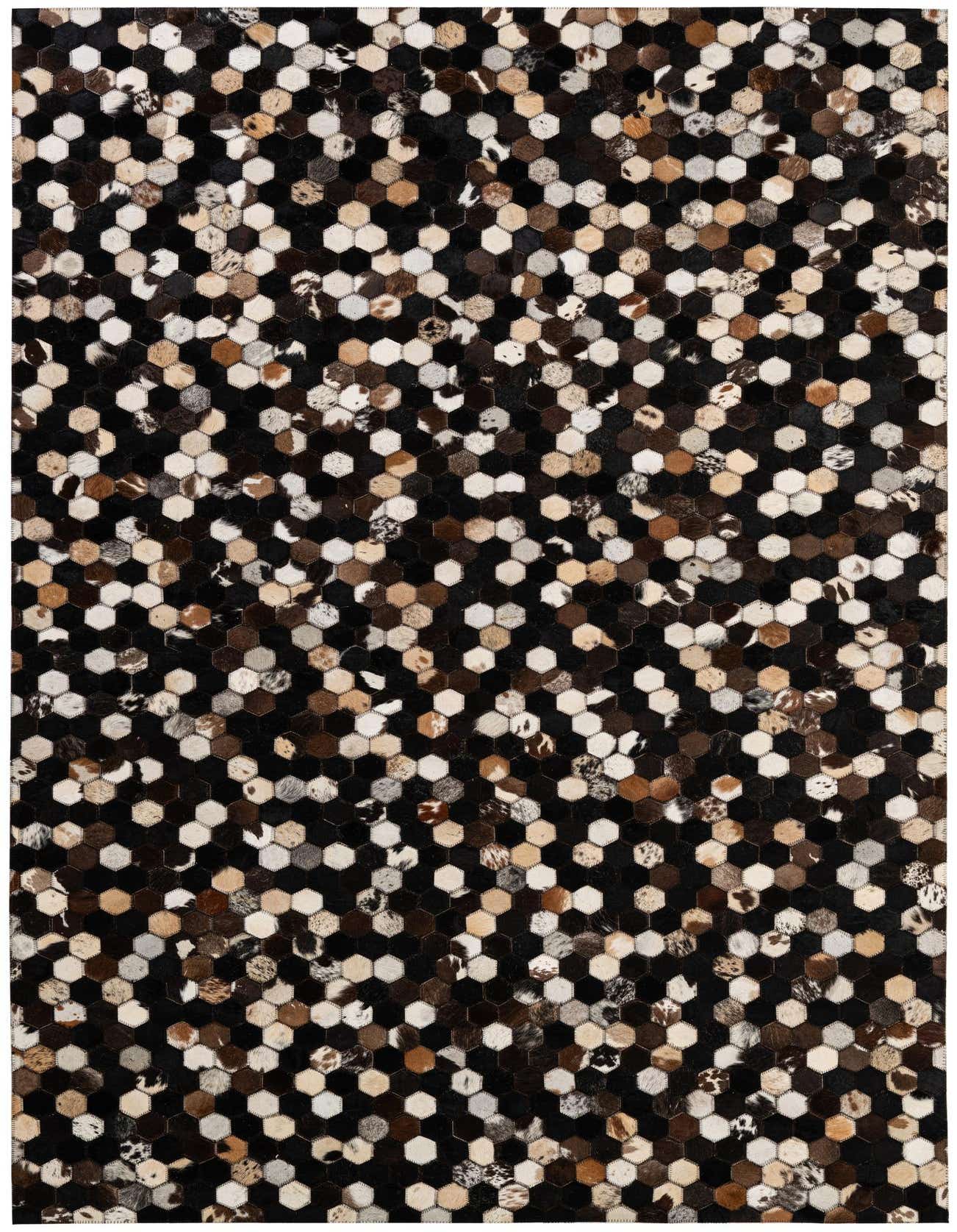A 5x8 rectangular Cowhide Patchwork rug featuring a modern geometric pattern of multi-colored hexagonal leather and cowhide patches.