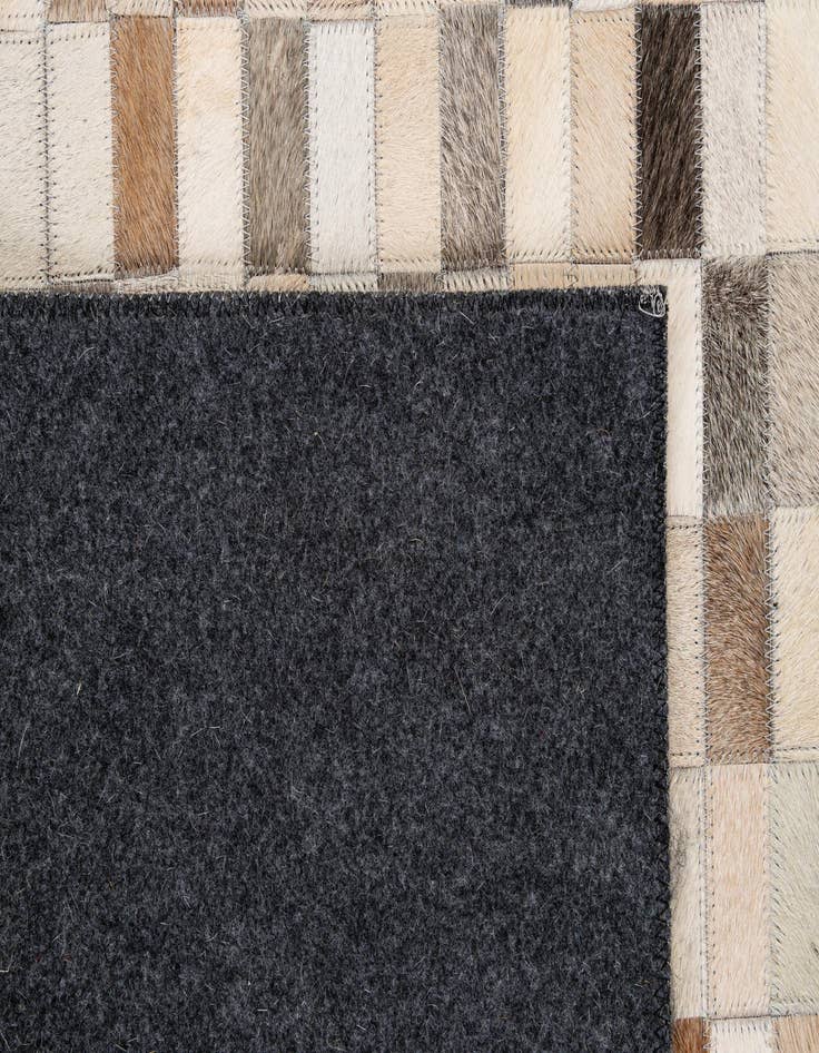 Detail image of  5' 1 x 8' Cowhide - Patchwork Rug