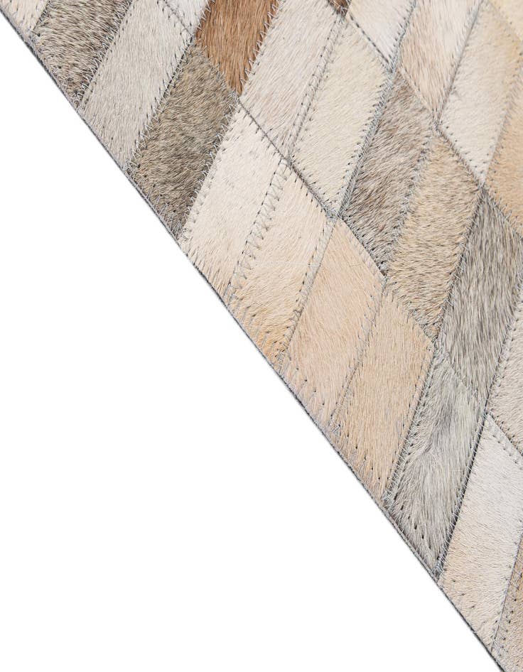 Detail image of  5' 3 x 8' Cowhide - Patchwork Rug