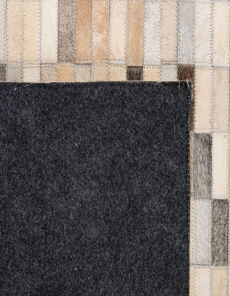 Detail image of  5' 3 x 8' Cowhide - Patchwork Rug