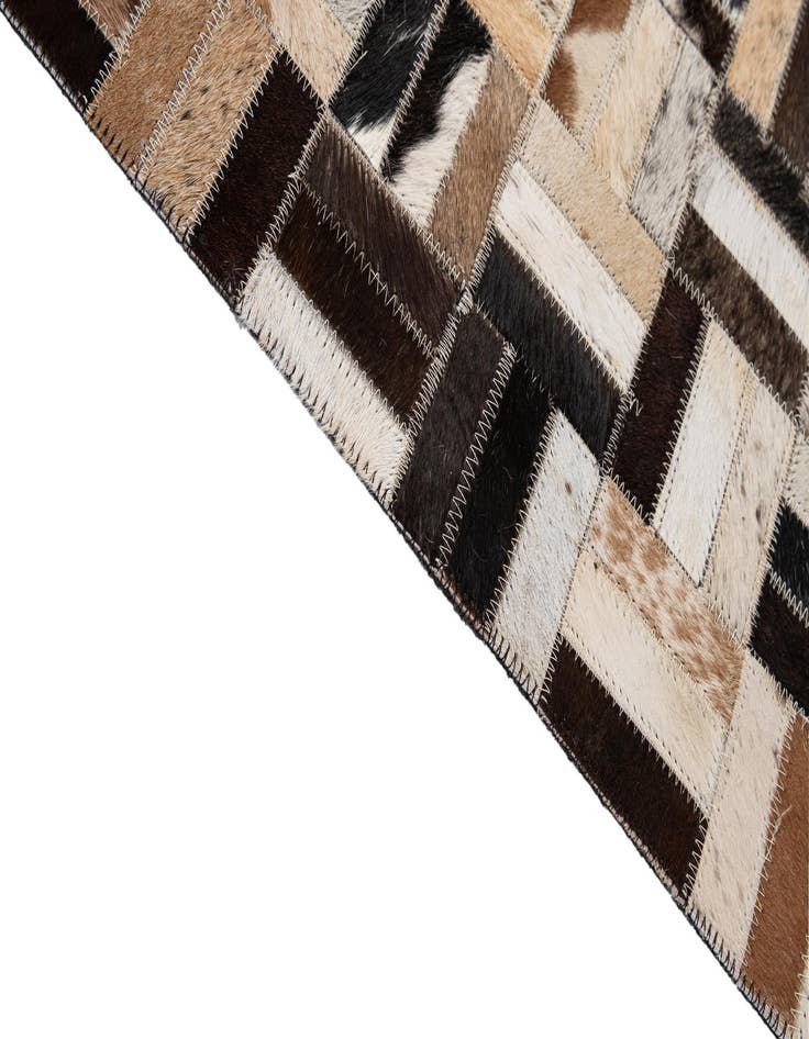 Detail image of  5' x 7' 11 Cowhide - Patchwork Rug