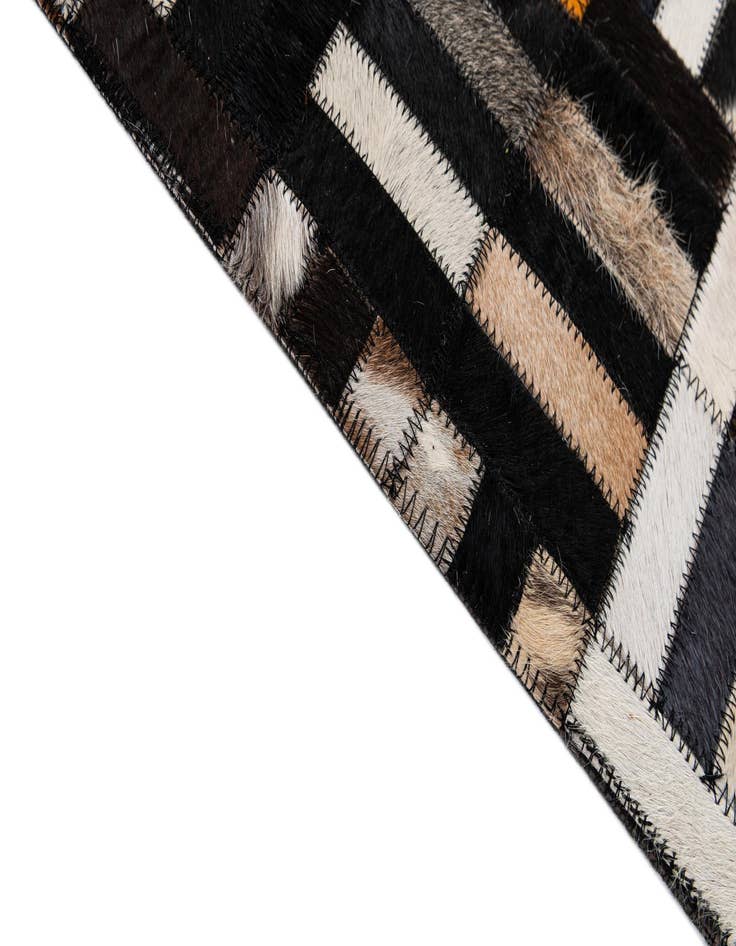 Detail image of  5' 2 x 8' 1 Cowhide - Patchwork Rug