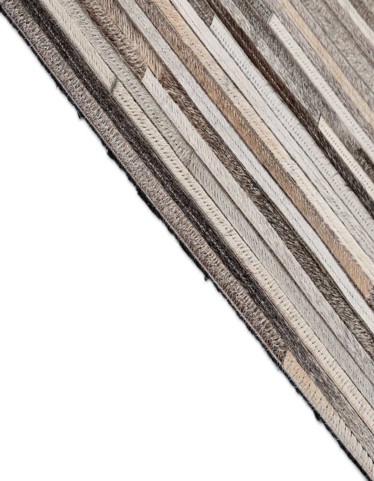 Detail image of  5' 1 x 8' 2 Cowhide - Patchwork Rug