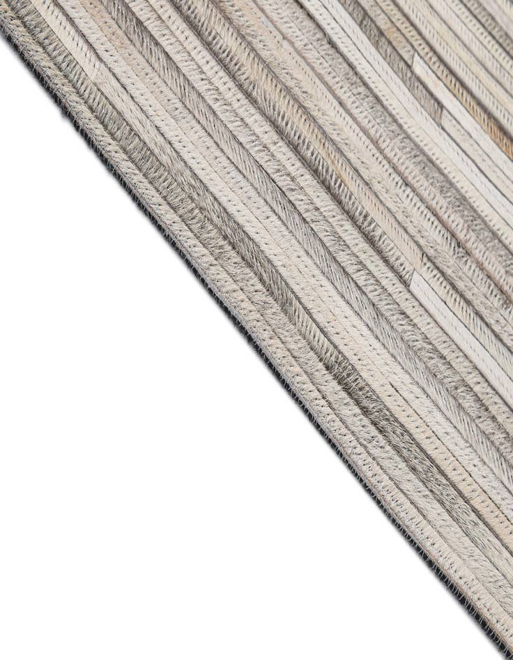 Detail image of  5' 2 x 8' Cowhide - Patchwork Rug