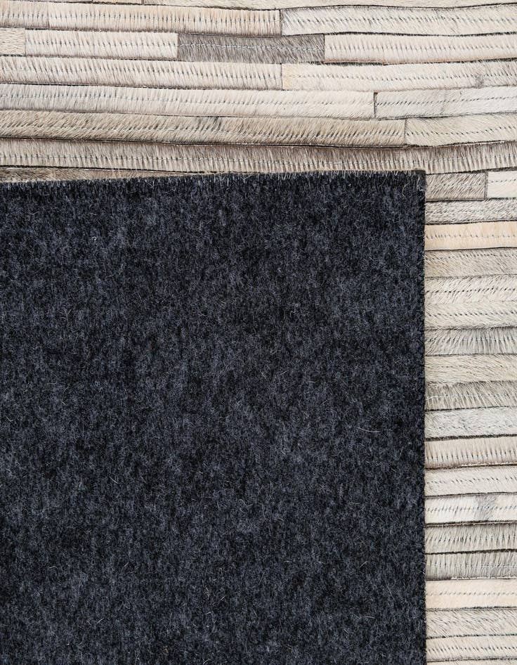 Detail image of  5' 2 x 8' Cowhide - Patchwork Rug