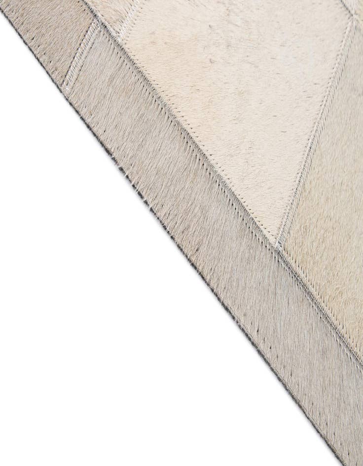 Detail image of  5' 2 x 7' 11 Cowhide - Patchwork Rug