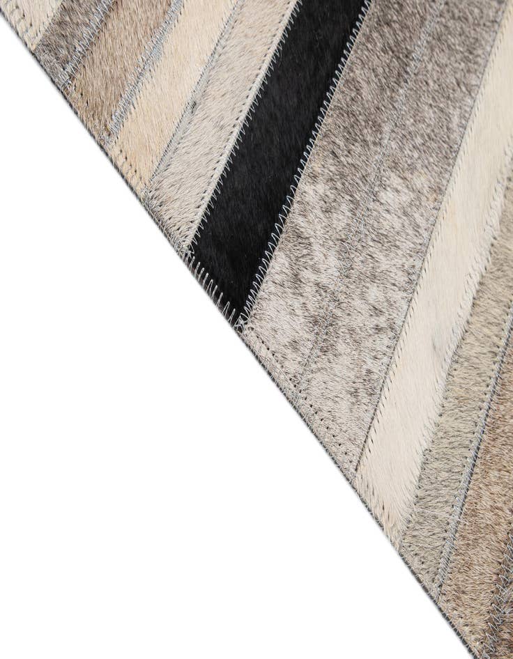 Detail image of  5' 1 x 8' 1 Cowhide - Patchwork Rug