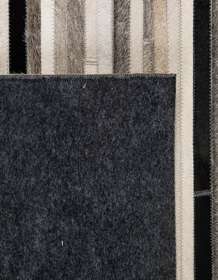 Detail image of  5' 1 x 8' 1 Cowhide - Patchwork Rug