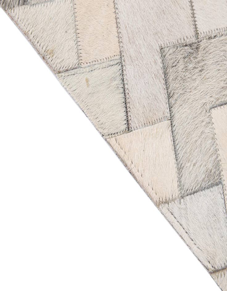 Detail image of  5' 2 x 7' 11 Cowhide - Patchwork Rug