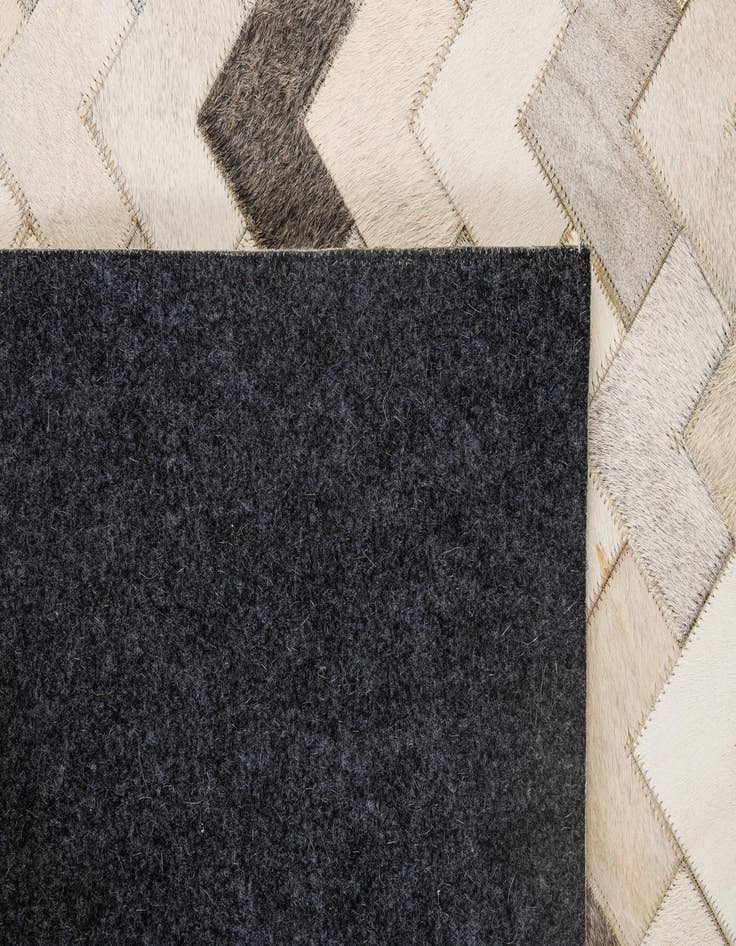 Detail image of  5' 2 x 7' 11 Cowhide - Patchwork Rug