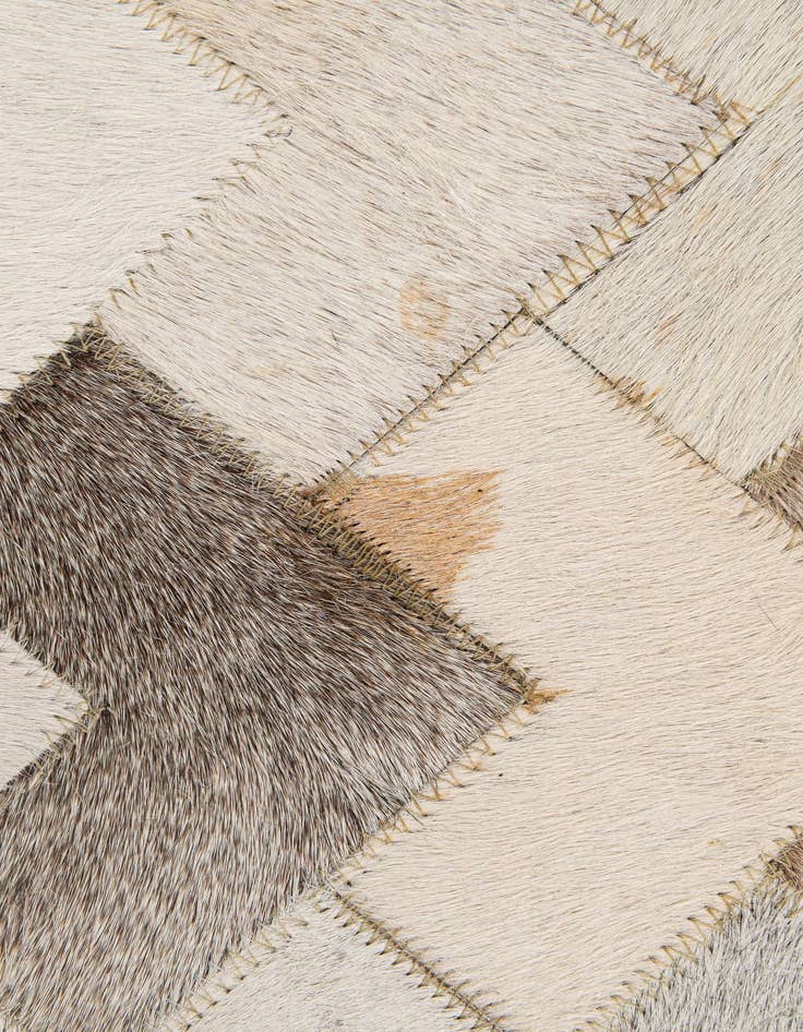 Detail image of  5' 2 x 7' 11 Cowhide - Patchwork Rug