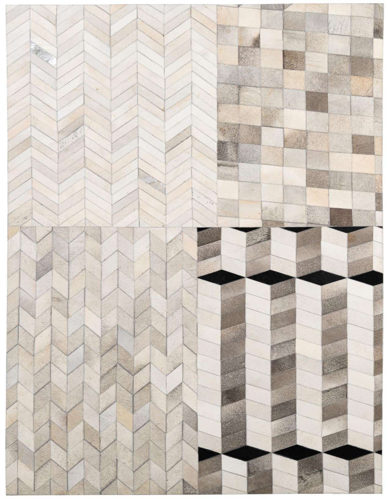 A rectangular 5x8 modern multi-colored cowhide rug featuring a patchwork design with chevron, square, and geometric cube patterns.