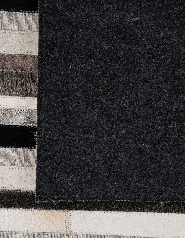 Detail image of  5' x 7' 11 Cowhide - Patchwork Rug
