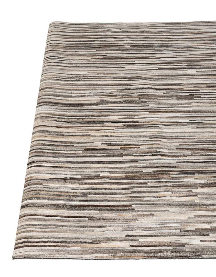 Detail image of  5' 1 x 7' 11 Cowhide - Patchwork Rug