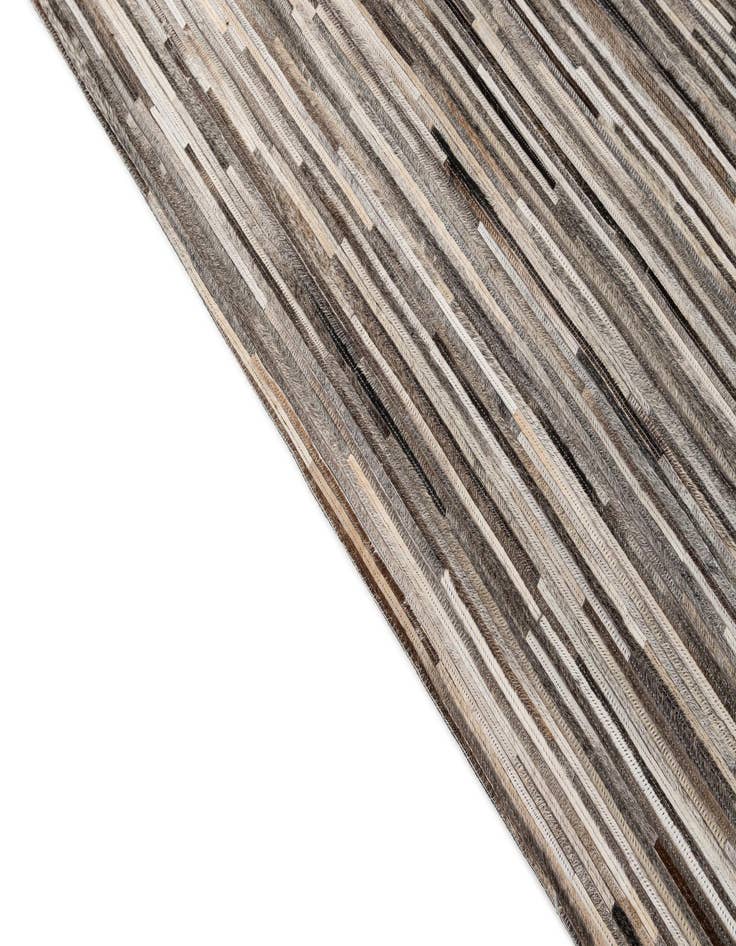 Detail image of  5' 1 x 7' 11 Cowhide - Patchwork Rug