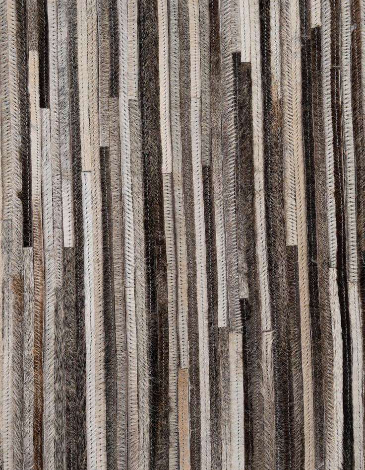 Detail image of  5' 1 x 7' 11 Cowhide - Patchwork Rug